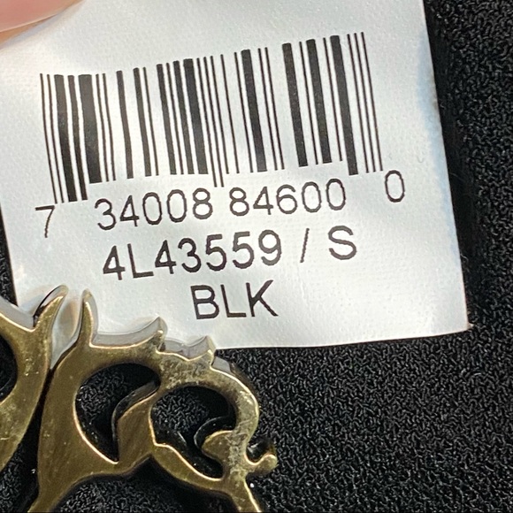 Karen Kane Sparkle Starlight Silver / Black
Cold Shoulder Jumpsuit
Size S - Picture 11 of 15